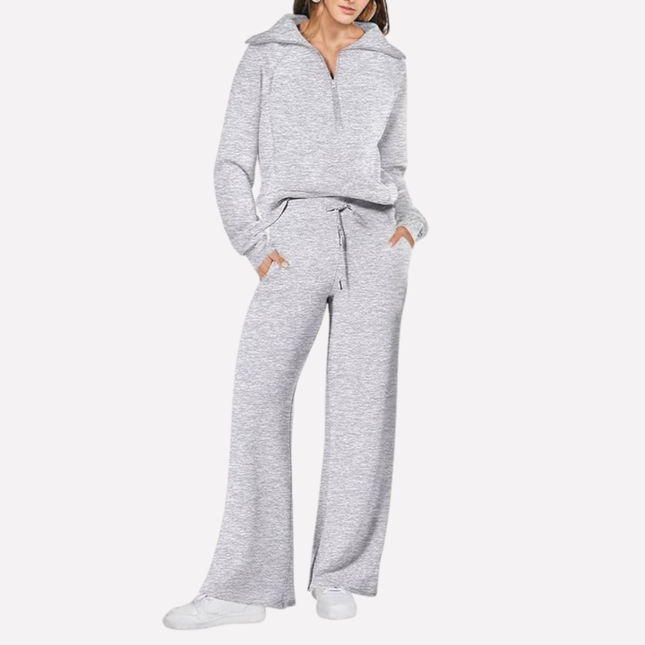New women's lounge wear: comfy 2-piece set with a stylish top and wide-leg elastic waist pants for relaxation.