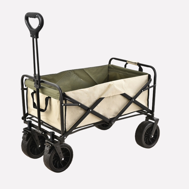 Rugged beach wagon for sand, loaded with beach gear, towels & cooler. Heavy duty collapsible design for family outings.