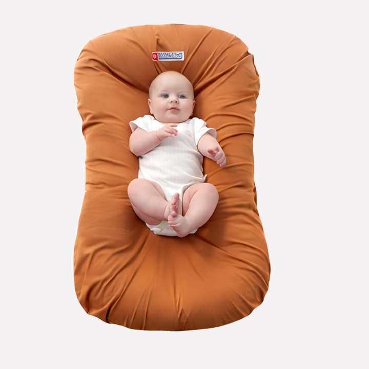 Contoured baby pillow provides essential head support & neck alignment for infants. Perfect nursery accessory for rest.