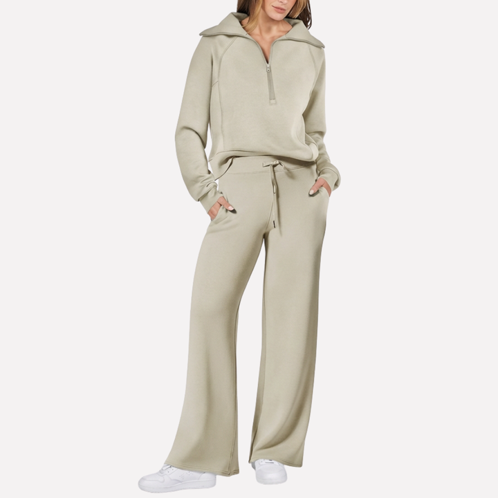 Women's comfortable 2-piece outfit: soft top & wide-leg pants with elastic waist. Perfect for lounge & travel.