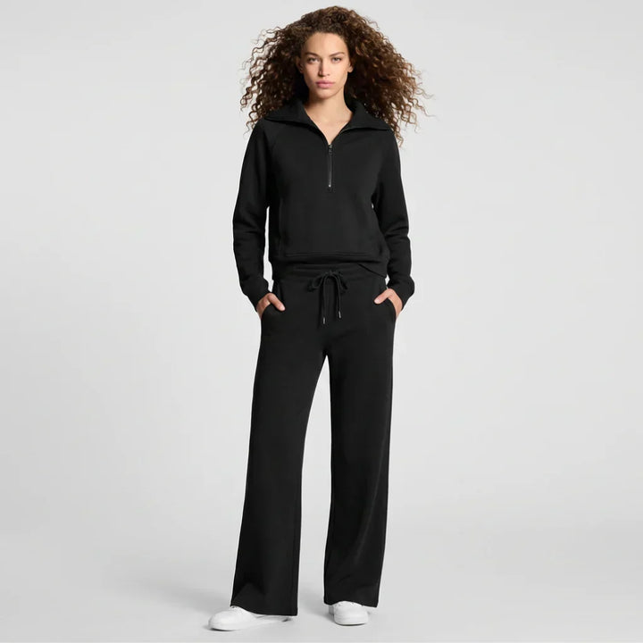 Women's 2-piece travel outfit: comfortable top & wide-leg pants. Perfect for vacation & casual wear.