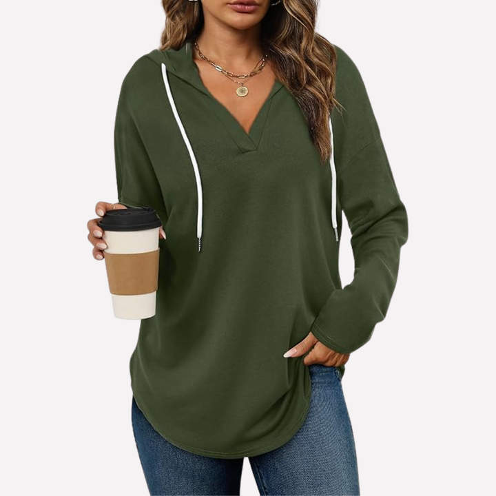 Versatile women's oversized pullover hoodie, great for everyday wear, comfort, and relaxed fit.