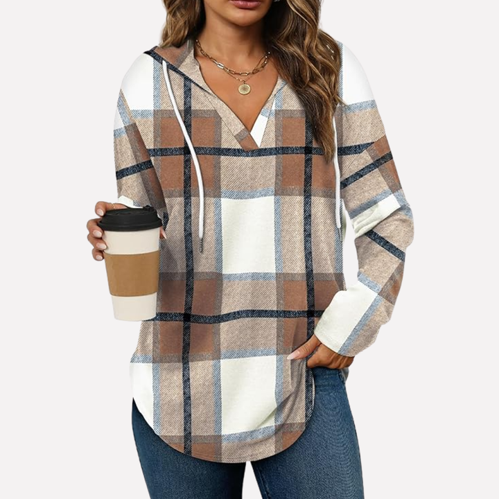 Soft oversized women's hooded pullover sweatshirt, ideal for casual wear and ultimate comfort.