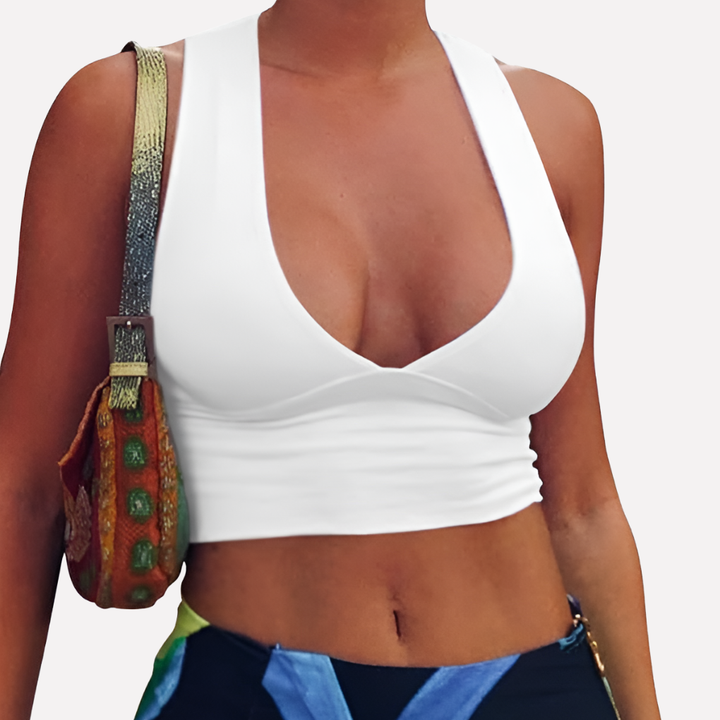 New women's stylish racerback cutout tank top. This cropped design offers a trendy look for casual summer fashion.