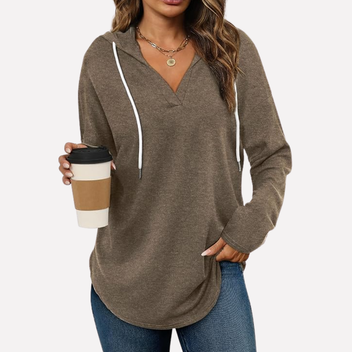 Long sleeve women's oversized pullover hoodie, great for fall fashion and winter style comfort.