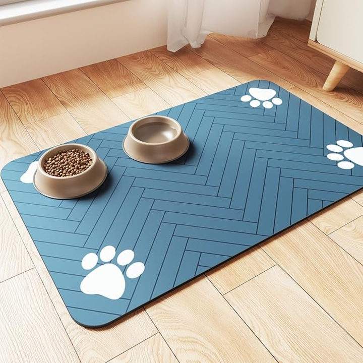 Durable pet feeding mat for dogs & cats. Absorbs food & water spills, protects floor. Easy clean accessory.