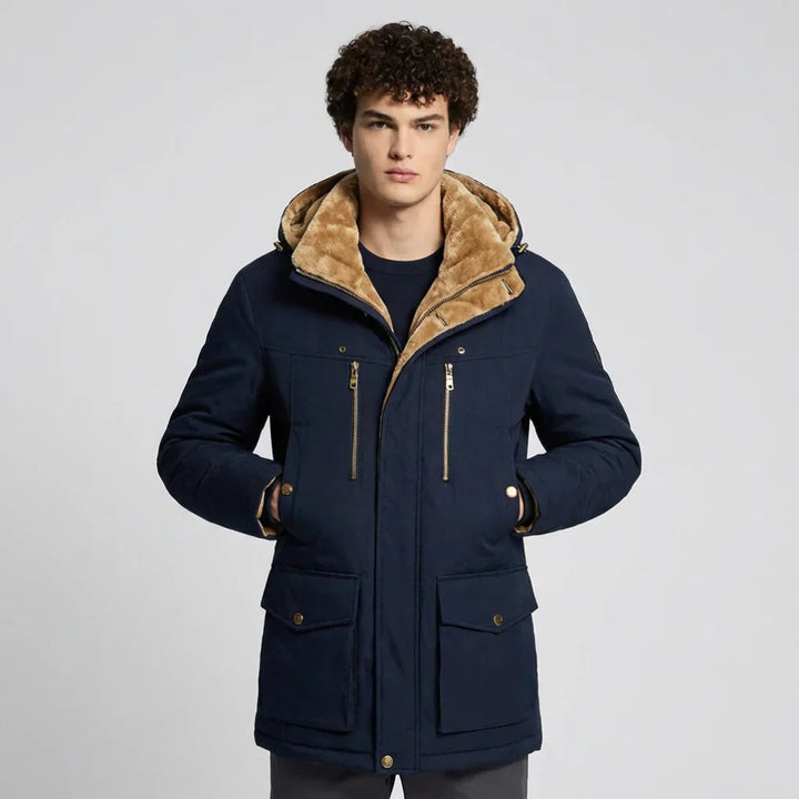 Men's insulated winter coat for extreme cold. Warm, durable outerwear with an adjustable hood & zipper closure.