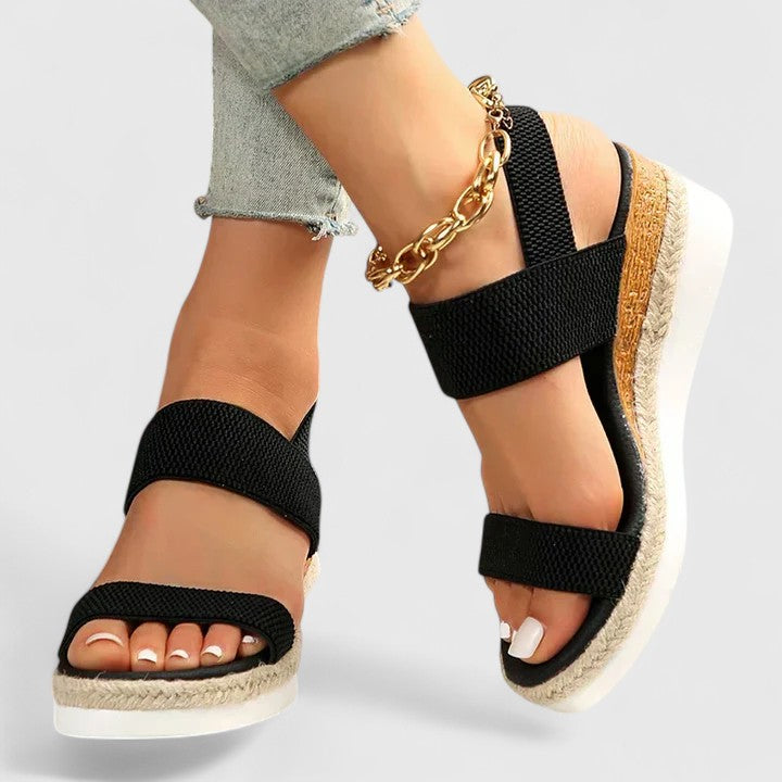 Close-up of soft straps on women's orthopedic comfort wedge sandals, ensuring a snug fit.