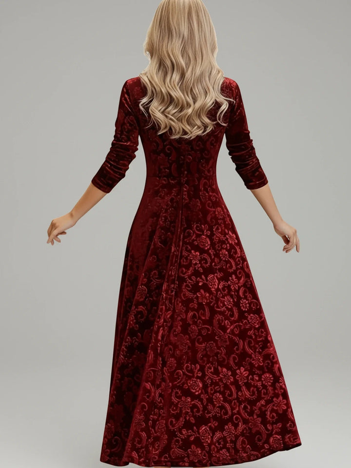Versatile women's midi dress featuring a vibrant floral pattern & flattering A-line silhouette. Ideal for elegant occasion wear.