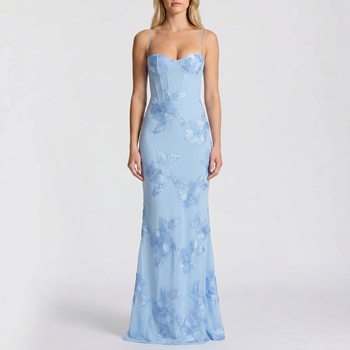 Long fitted floral appliqué spaghetti strap dress for women, an elegant choice for any special evening.