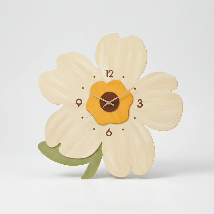 Large flower-shaped wall clock, adding a touch of nature and modern elegance to home interiors.