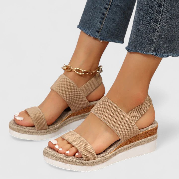 Pair of women's orthopedic wedge sandals, ready for comfortable casual wear & summer walks.