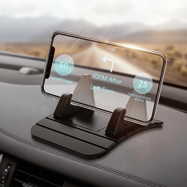 Non-slip silicone car phone holder securely gripping a dashboard, perfect for hands-free navigation & smartphone use.