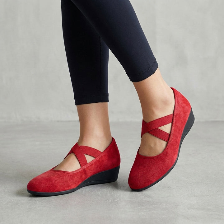 Comfortable women's orthopedic wedge flats with criss-cross straps. Ideal for all-day support.