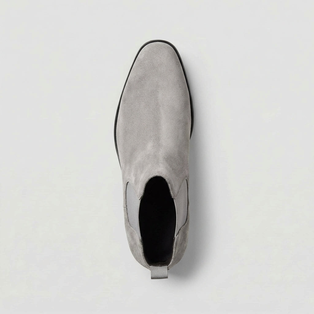 Modern grey men's Chelsea boots. Stylish & versatile slip-on footwear for everyday comfort and flair.