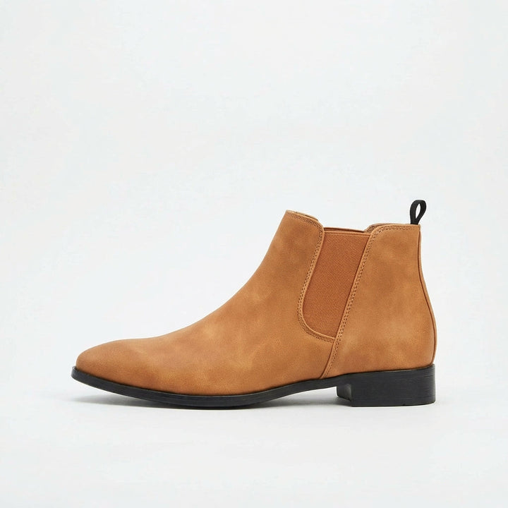 Blue versatile men's Chelsea boots. Comfortable slip-on footwear for a smart casual or dress look.