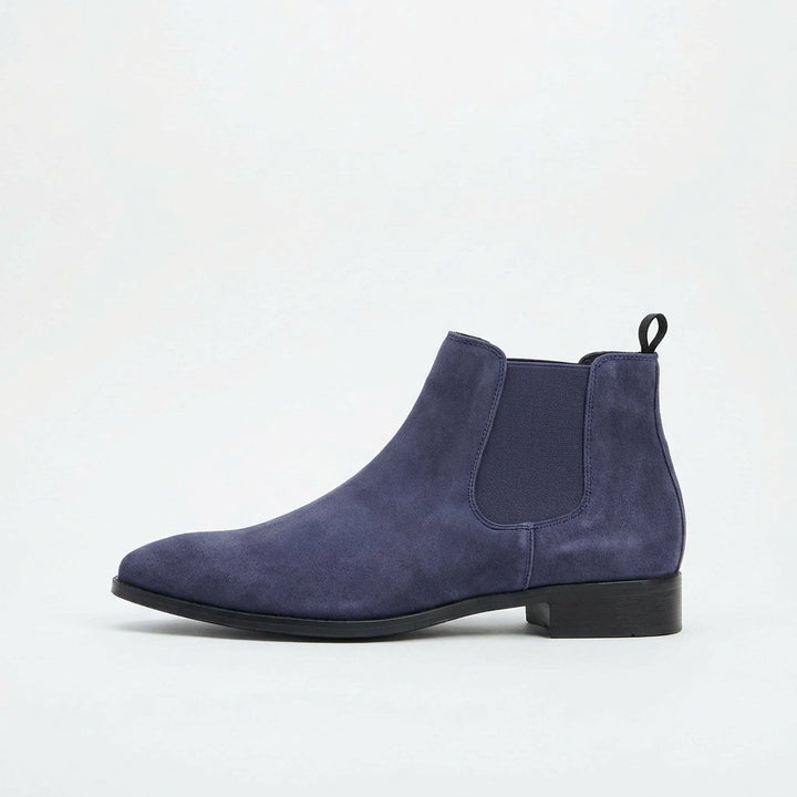Casual grey men's Chelsea boots. Versatile slip-on design, comfortable and stylish for everyday wear.