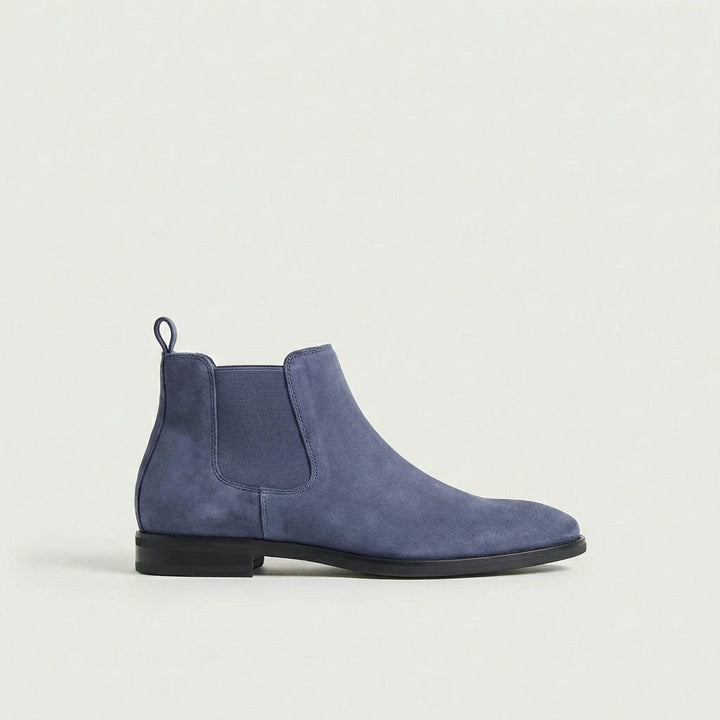 Dressy brown men's Chelsea boots. Versatile and comfortable slip-on footwear for any stylish event.