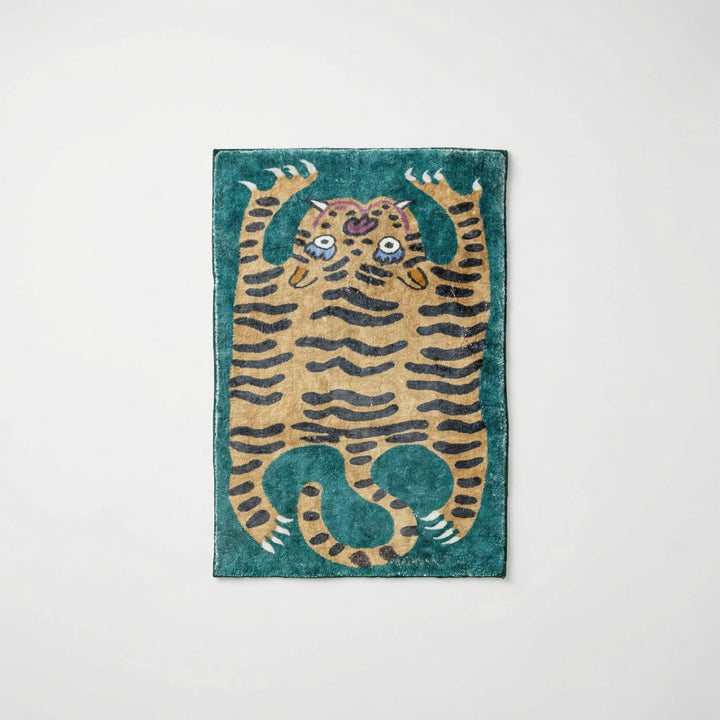 Flowique area rug: a playful animal print rug with waves, designed for colorful kids' rooms.