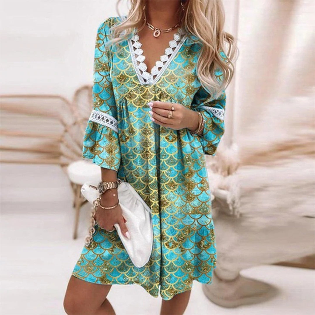 Casual women's boho summer dress, knee-length, ideal for beach days, vacation, or a chic festival outfit.