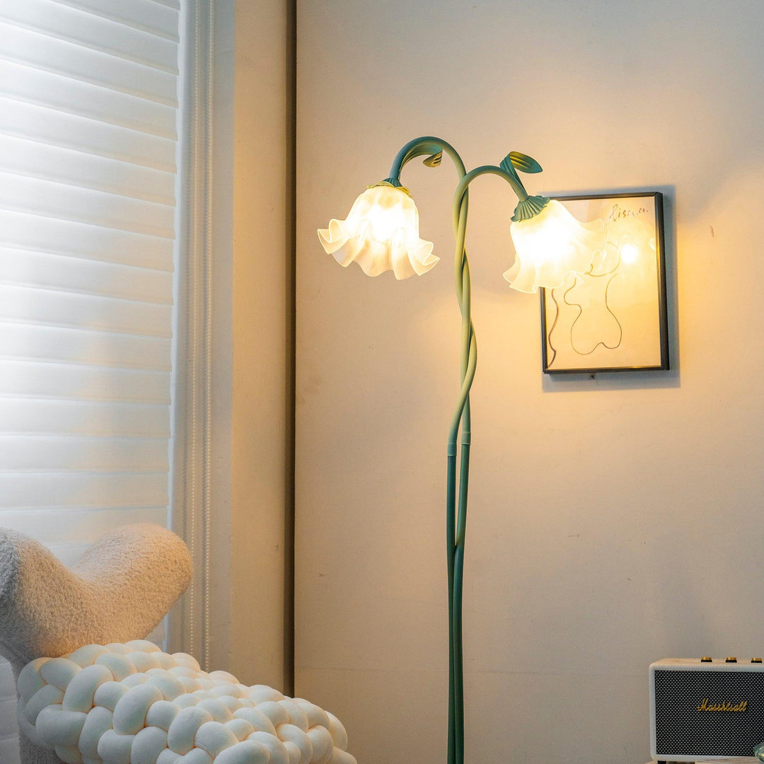 Green floral floor lamp, provides soft ambient lighting for a cozy living space.