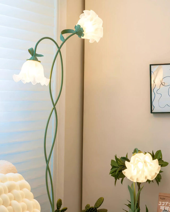 Elegant green botanical floor lamp, a modern floral light source for any home.