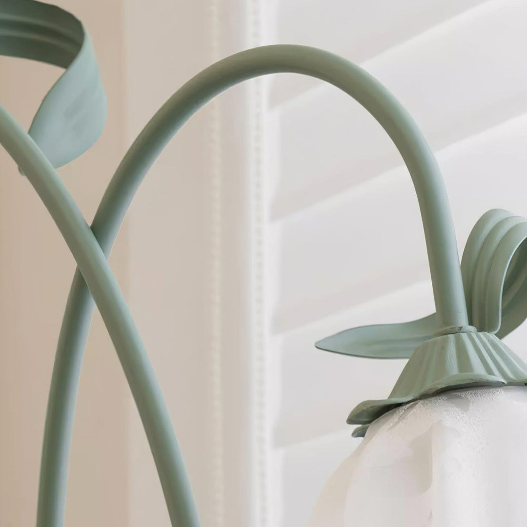 Decorative green floral floor lamp, white shade, modern and botanical for home.