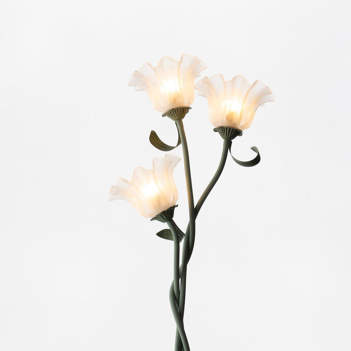 Green floral floor lamp, white shade, modern ambient lighting solution with botanical flair.