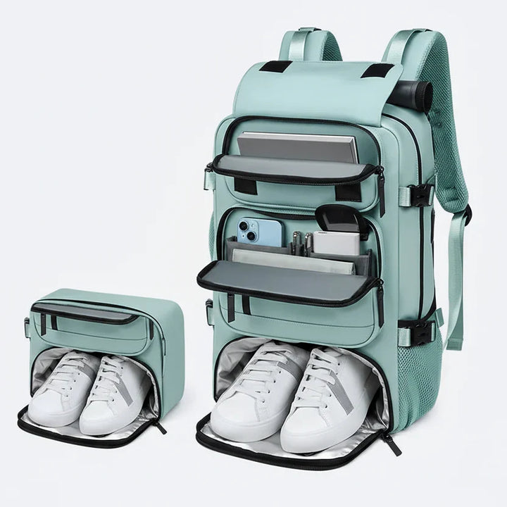 Expandable carry-on travel backpack for men & women, waterproof, with USB port, laptop sleeve & shoe compartment.