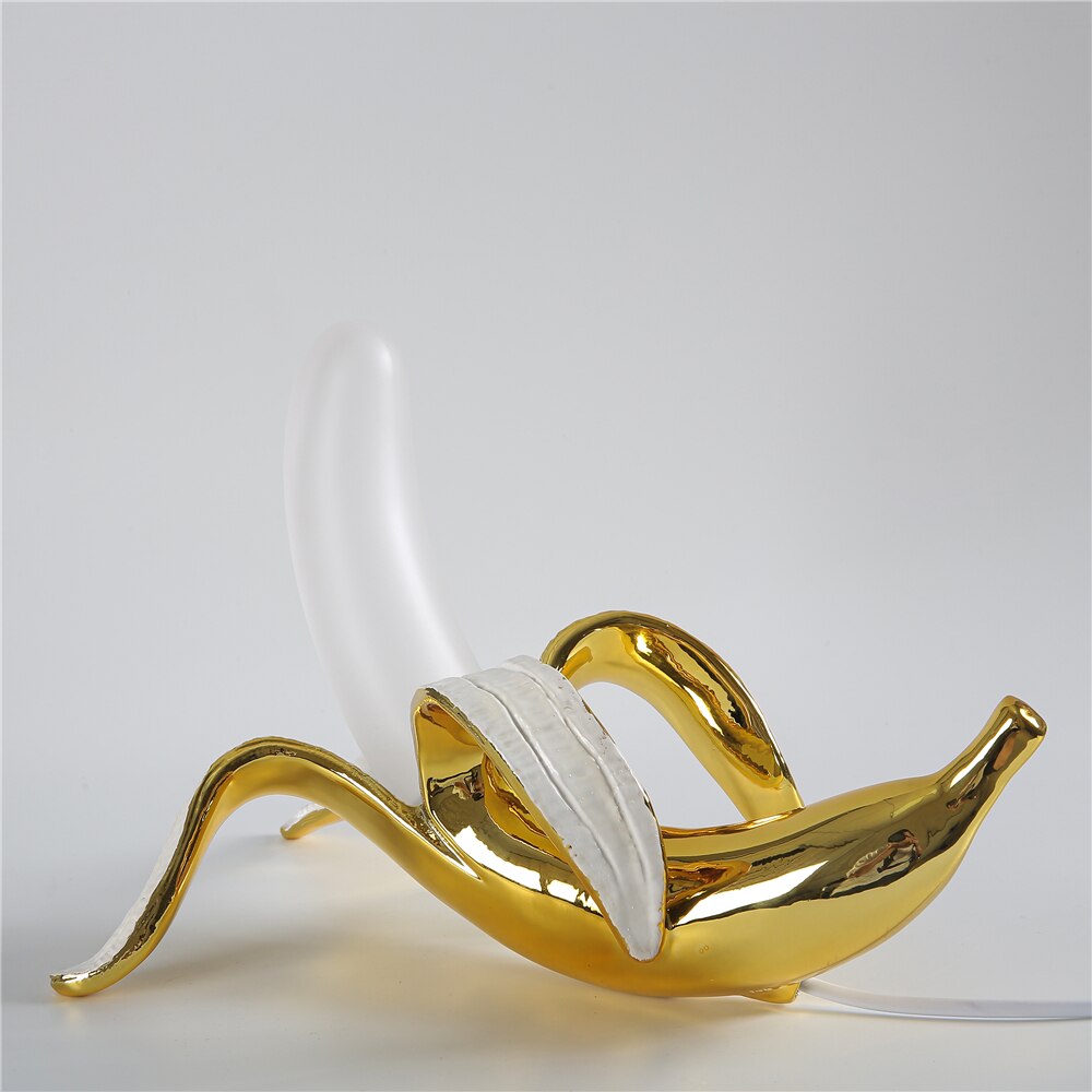 Elegant brass & chrome table lamp, modern decorative style, perfect for home ambiance.