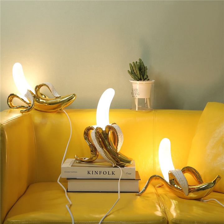 Art Deco inspired table lamp, elegant brass and chrome, unique lighting fixture.