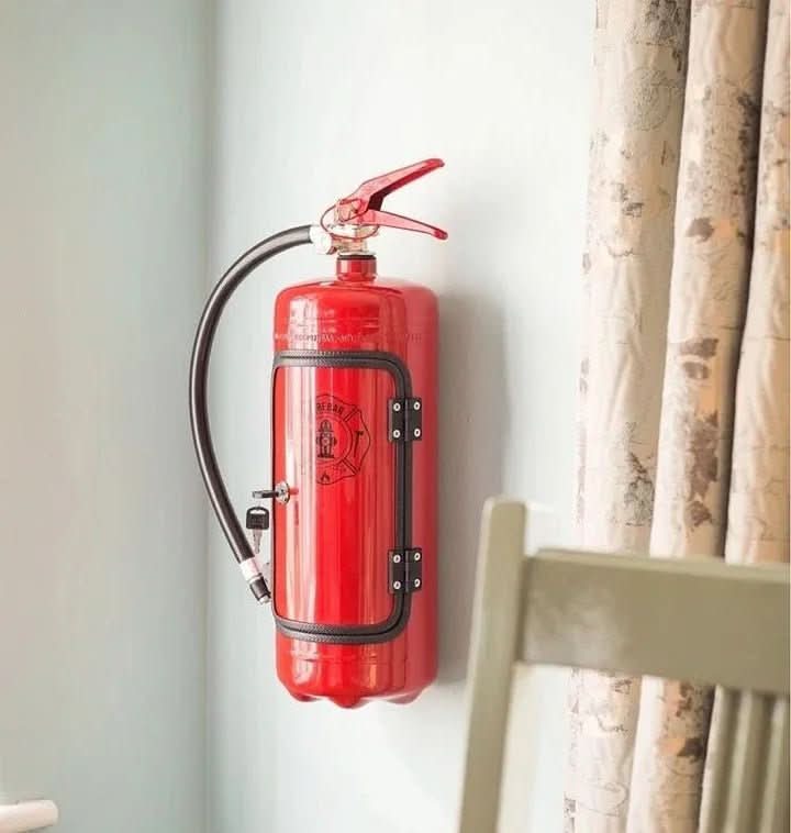 Realistic fire extinguisher hidden mini bar cabinet, perfect for secret drink storage & novelty home decor. Unique gift.