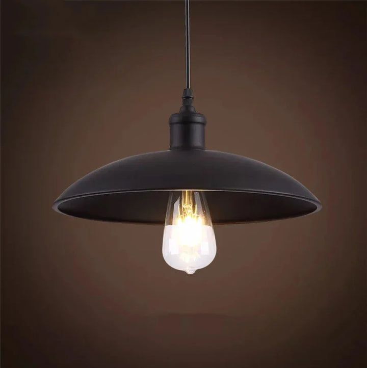 Rustic iron pendant light, farmhouse inspired, perfect for creating a cozy atmosphere.