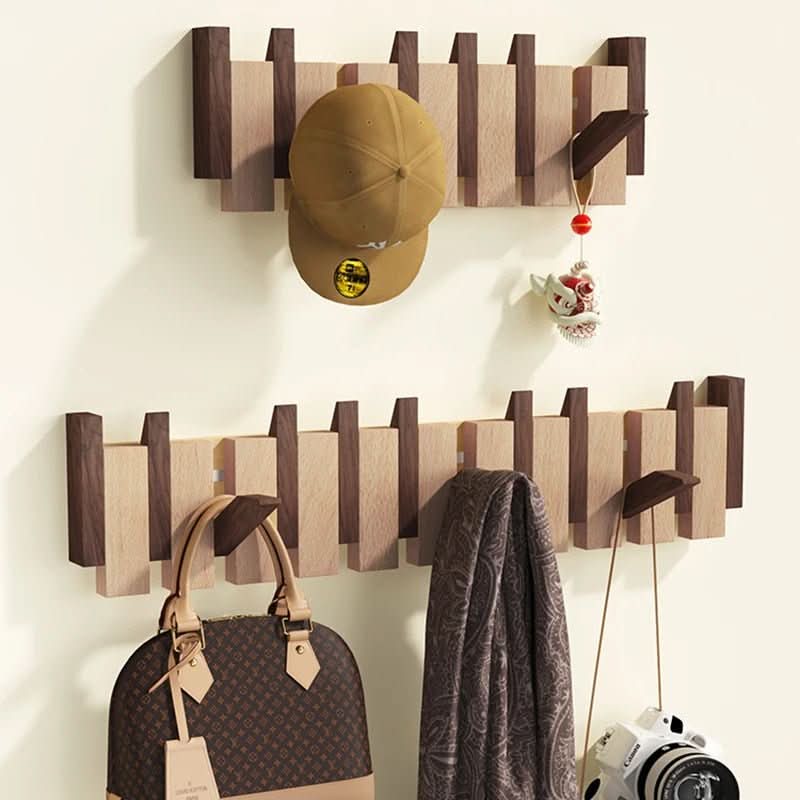 Modern wall coat rack with unique piano style & foldable hooks. A functional piece of elegant home decor.