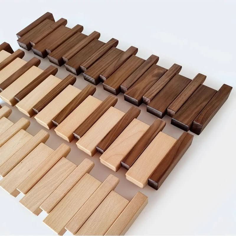 Elegant piano style wall coat rack: a clever space-saving organizer with foldable hooks for any home.