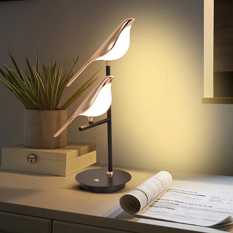 Luxurious gold finish avian LED wall lamp, a modern decorative bird sconce for stylish interior lighting.