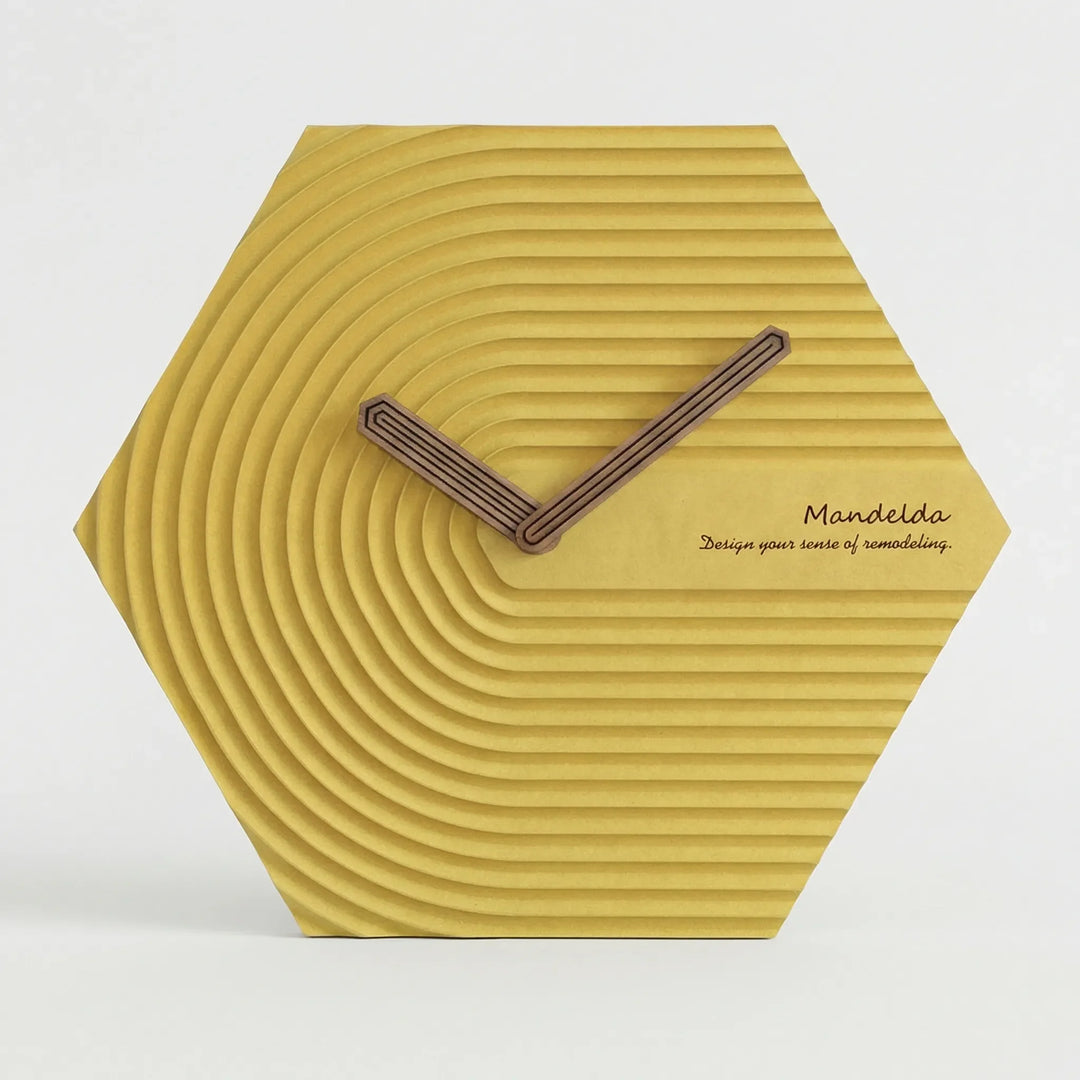 Contemporary hexagonal wall clock, silent operation, great for living room or office decor.