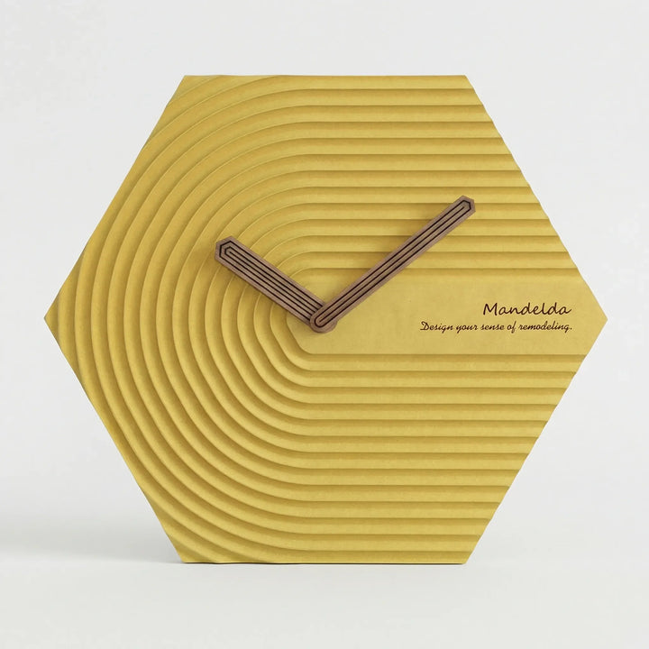 Contemporary hexagonal wall clock, silent operation, great for living room or office decor.