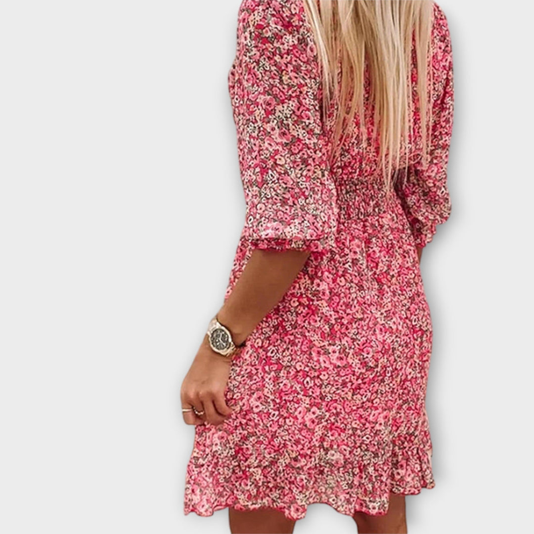 Beautiful women's floral A-line midi dress with puff sleeves. Ideal elegant or casual wear for spring & summer.