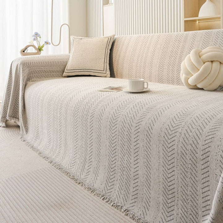 Protect your couch with this washable, scratch-resistant chenille sofa cover. Ideal for pet owners.