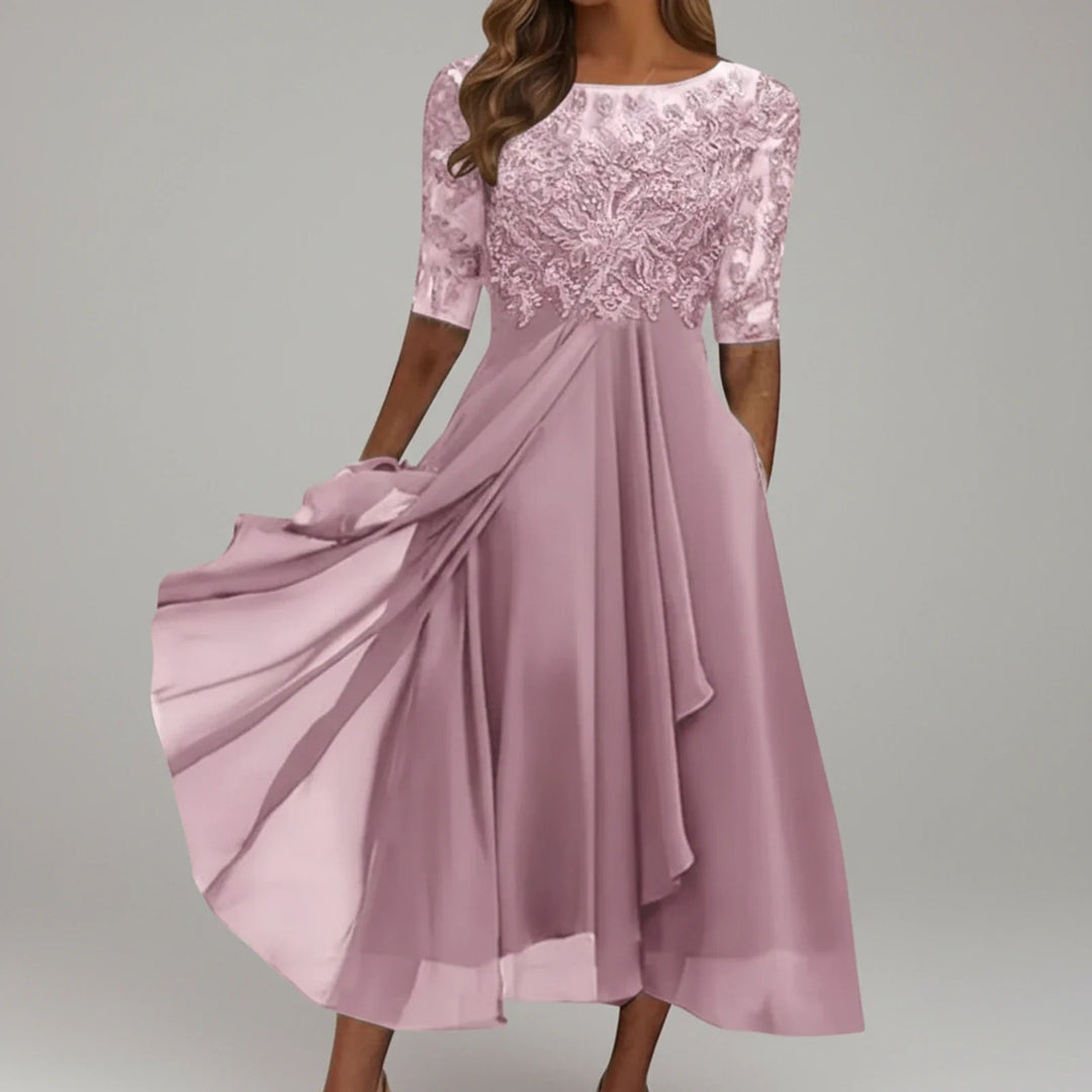 Women's chic A-line midi dress with delicate lace details, empire waist, and 3/4 sleeves for party or occasion.