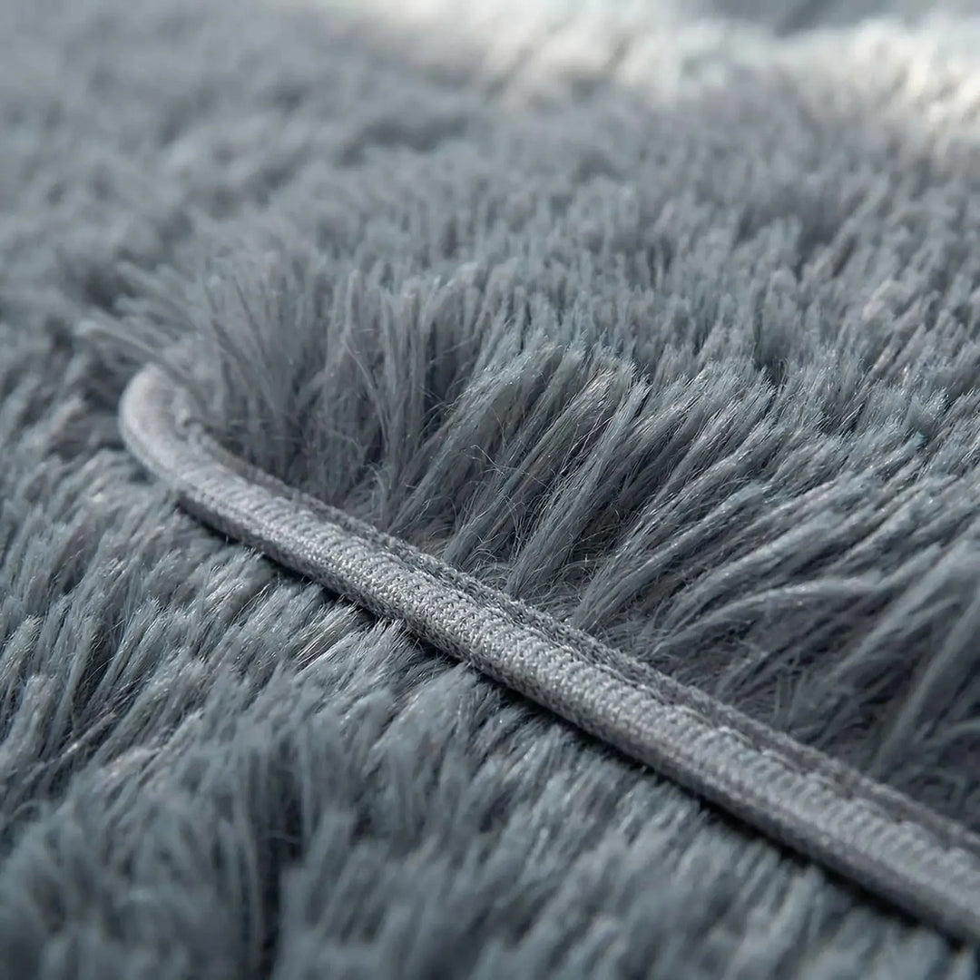 Flowique wave pattern rectangular area rug; soft plush, low pile & non-slip for versatile home decor.
