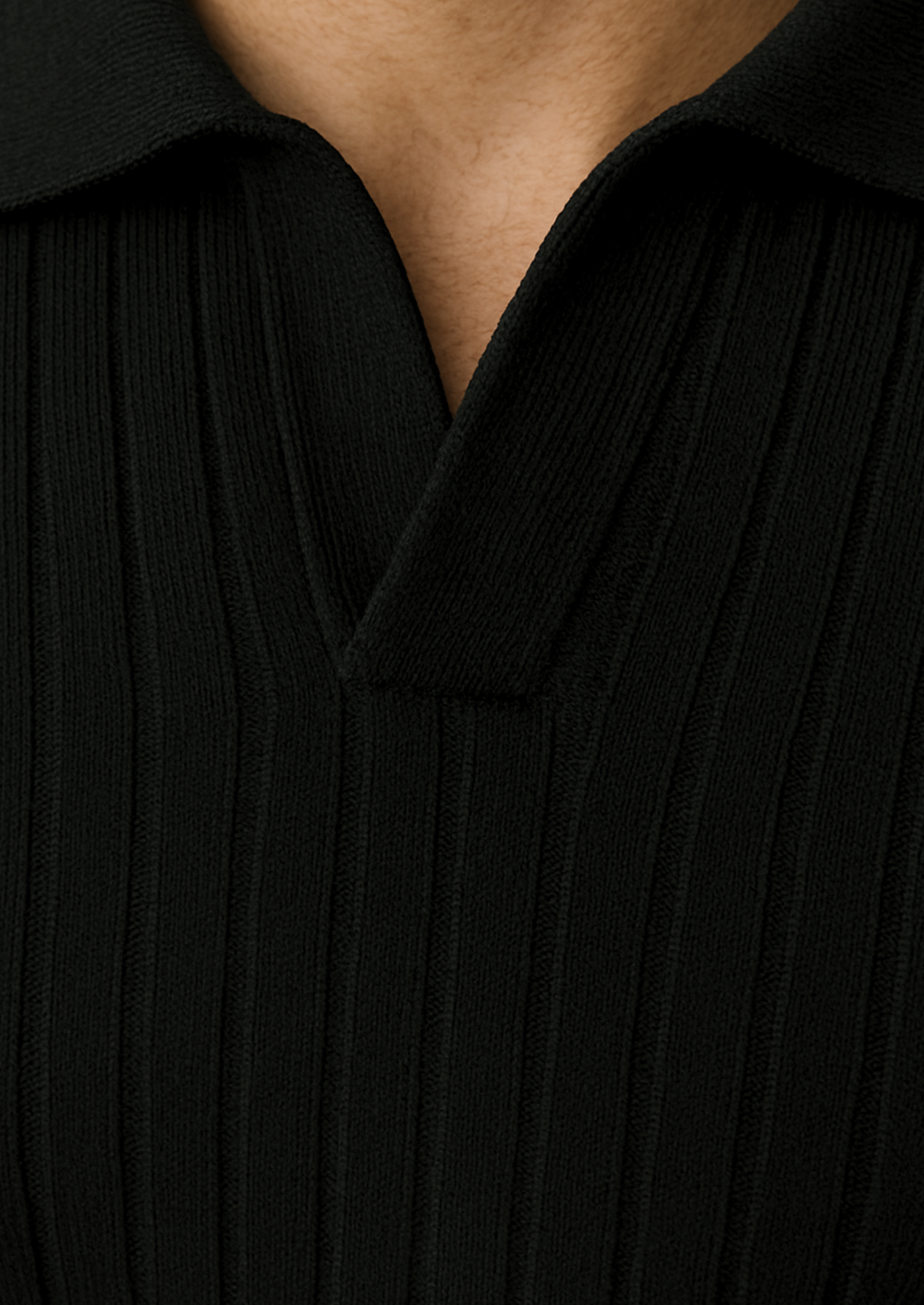 Modern men's black ribbed polo sweater. Smart casual long sleeve knit top with open collar design.