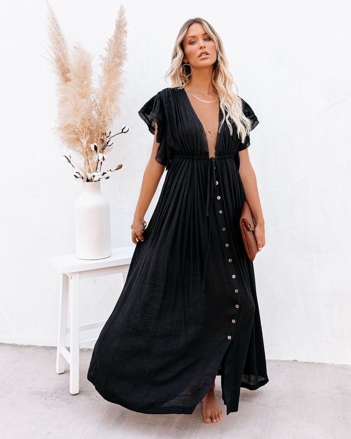 Women's flowy boho maxi dress in a relaxed fit, perfect for summer vacations. Effortlessly elegant bohemian style.