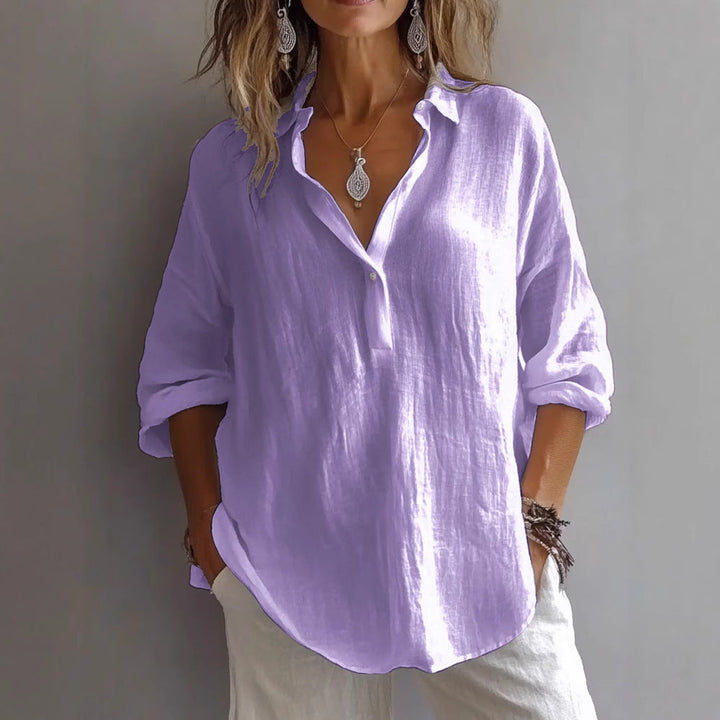 Sophisticated women's button-down shirt, wide sleeves, relaxed fit, suitable for office & casual.