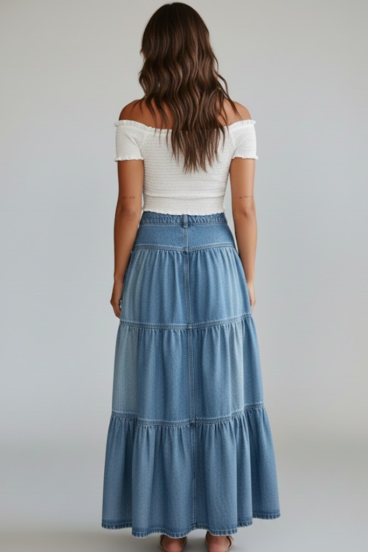 Flowy women's tiered maxi skirt with charming button details. A chic high-waist choice for warm weather.
