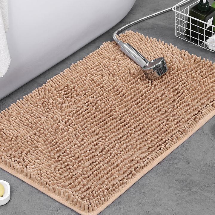 Stylish floor mat for bathrooms, a plush and absorbent rug with secure non-slip backing for modern decor.