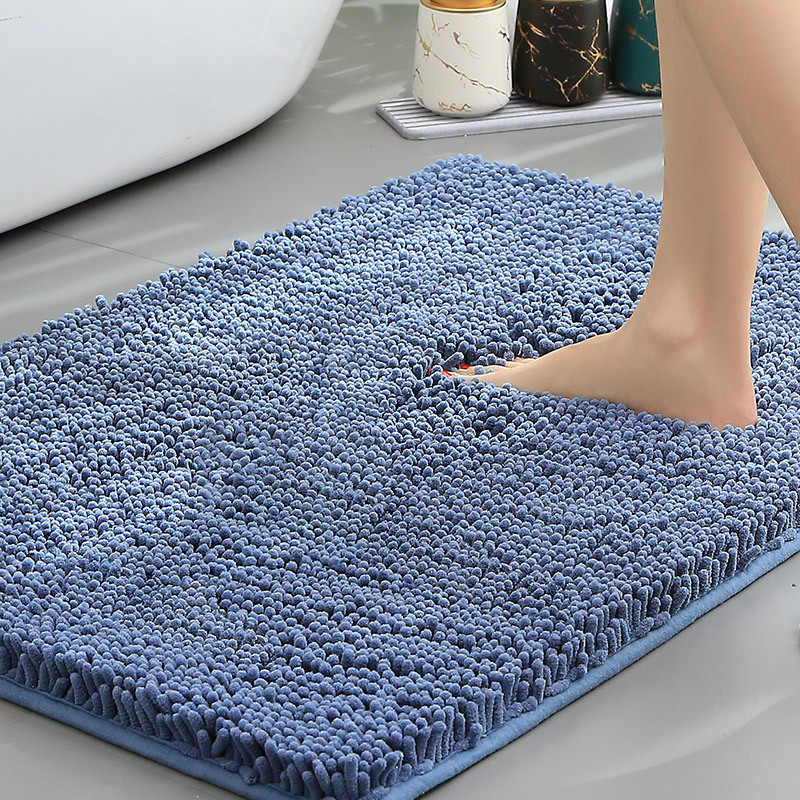 Thick plush chenille bath mat, ultra-absorbent with a secure non-slip backing for bathroom safety & comfort.