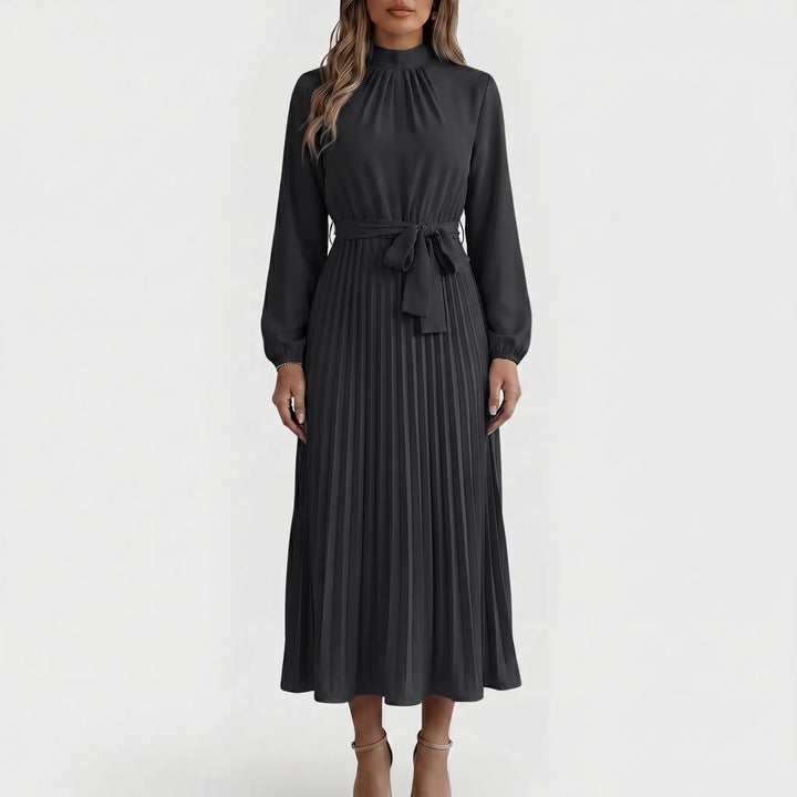 Versatile women's long-sleeve pleated midi dress with tie waist, great for spring, fall, formal, or smart casual wear.
