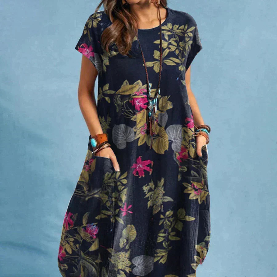 Women's floral midi dress with convenient pockets, perfect for casual summer style and everyday wear.